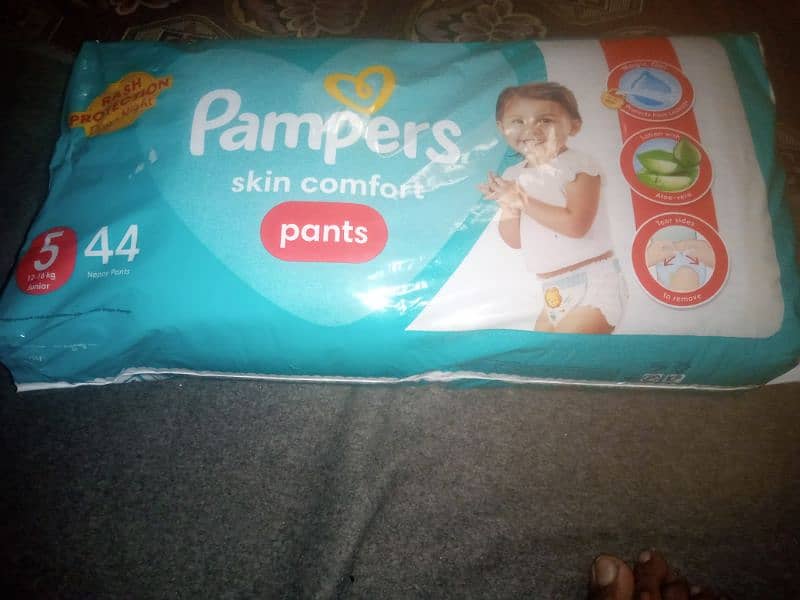 pieluchomajtki pampers premium care 3 do czego sluzy przlepny pasek